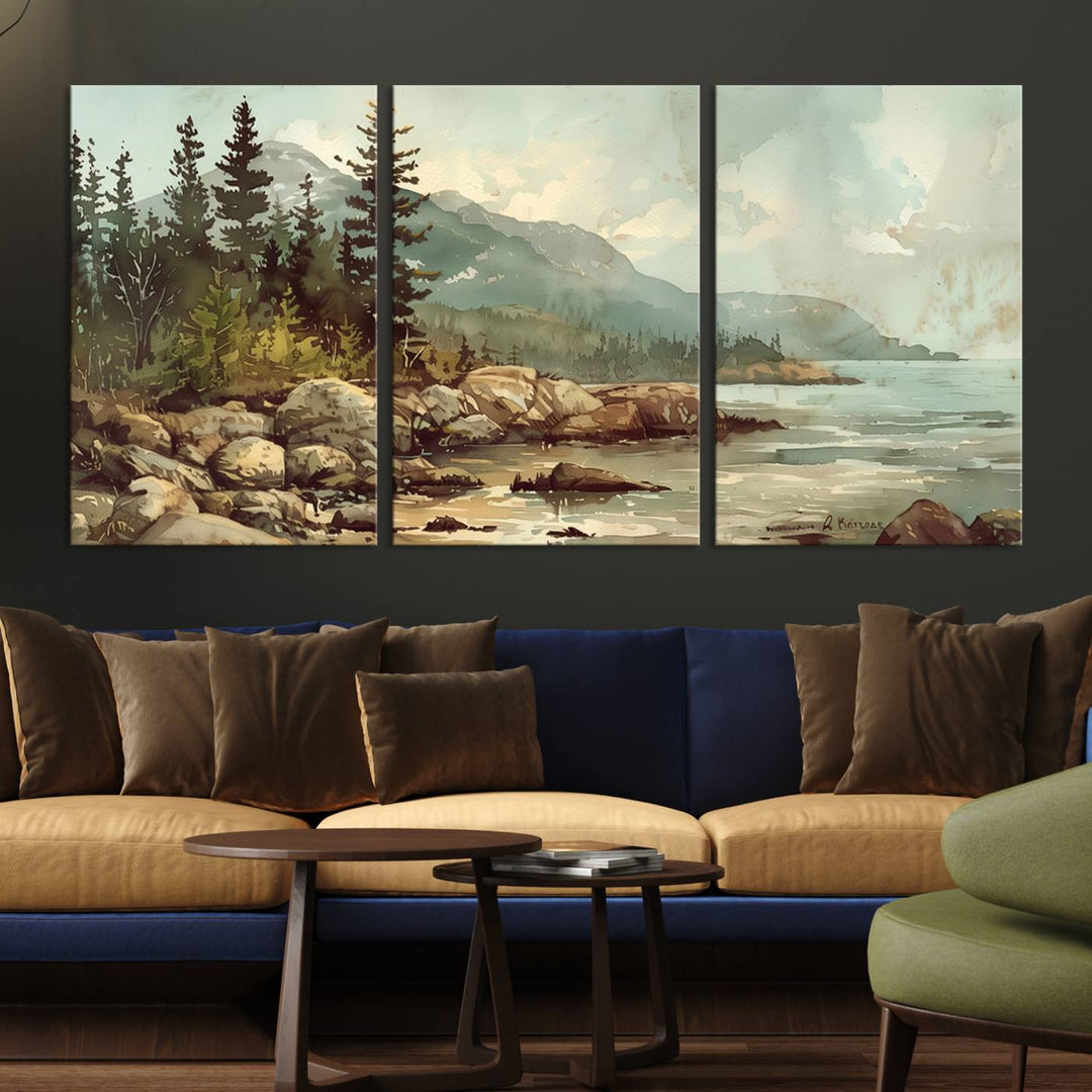 The living room features a breathtaking three-panel Abstract Acadia National Park Wall Art Canvas Print, which beautifully captures the rocky Maine coastline with trees and mountains.