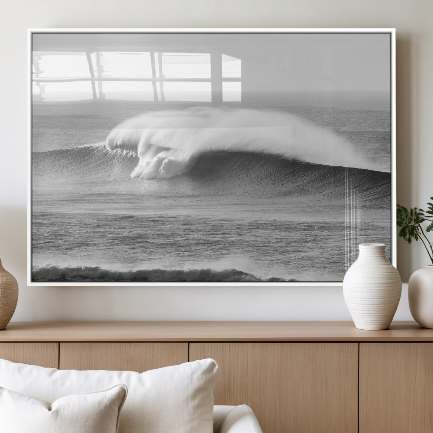 A dramatic black and white ocean wave crashing with immense force, capturing the raw power and movement of the sea in a bold seascape.