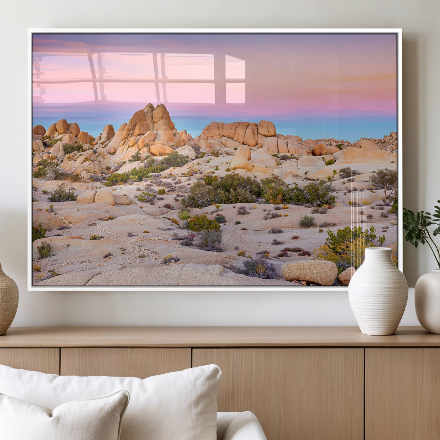 A breathtaking desert landscape featuring rugged rock formations under a vibrant pastel sunset sky, capturing the warmth and serenity of a Southwestern wilderness.
