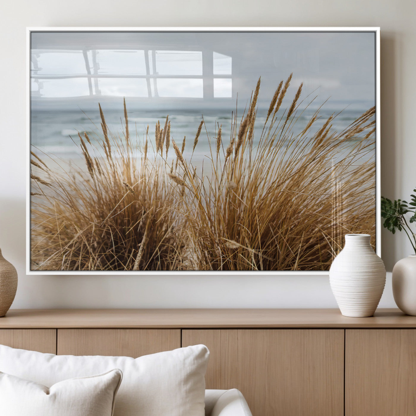 Canvas of golden beach grass swaying by the ocean under a soft cloudy sky, perfect for neutral-toned or coastal minimalist decor.
