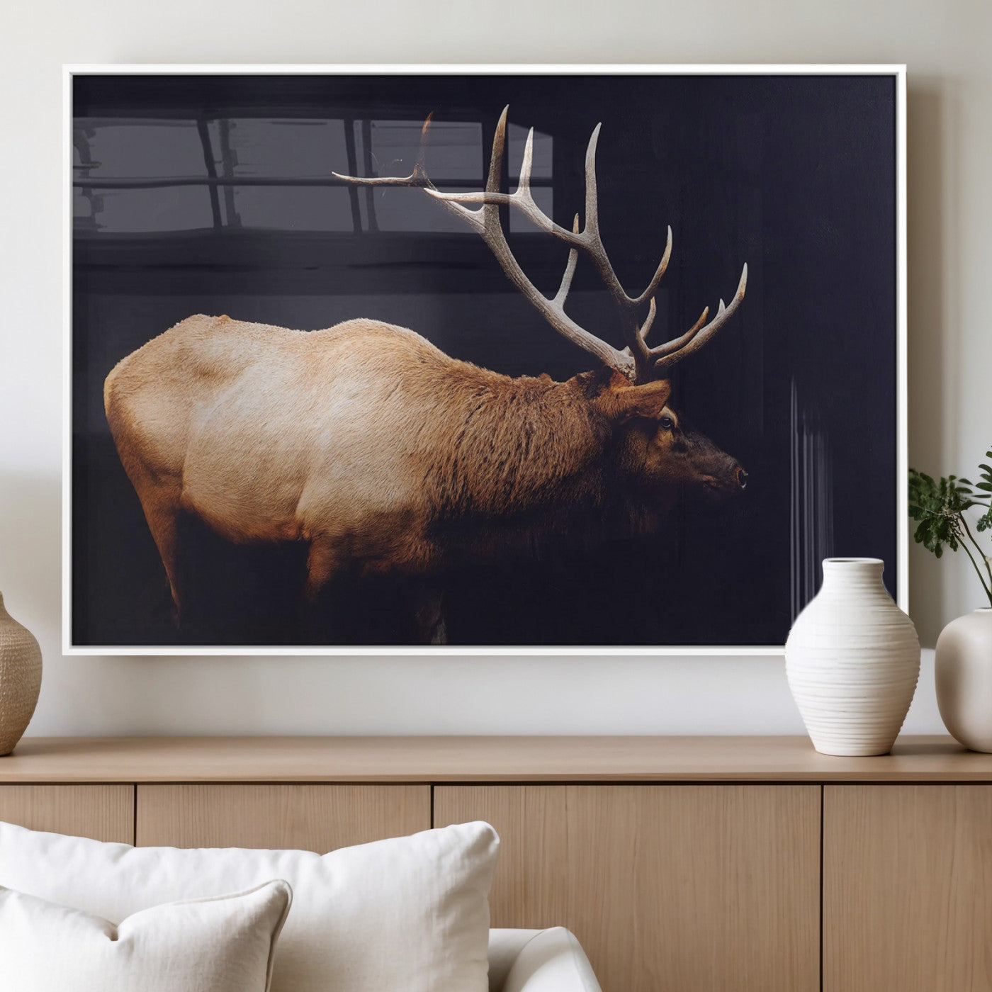 Side profile of an elk with large antlers on dark background, creating a bold rustic statement for cabin or Western-themed decor.