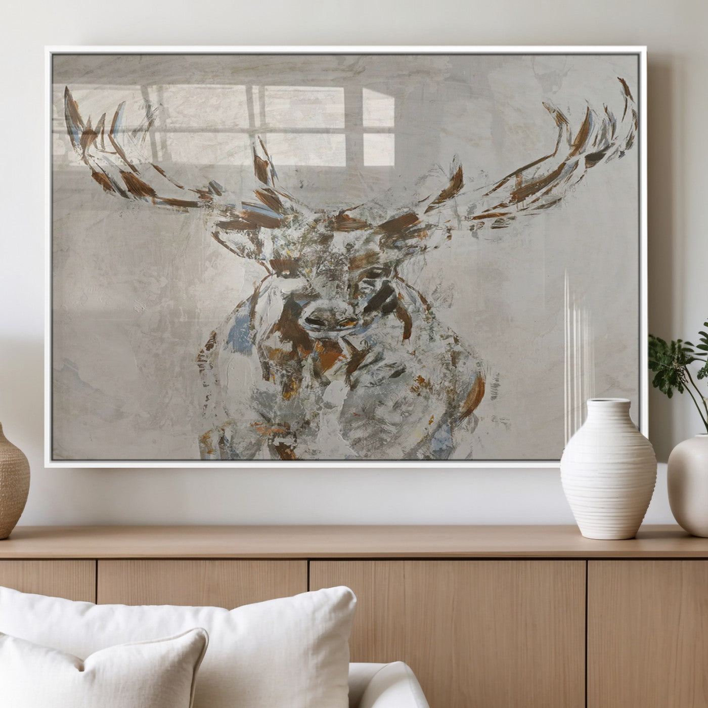 Abstract painting of a deer with antlers in neutral earth tones, ideal for modern rustic or lodge-style living room wall decor.