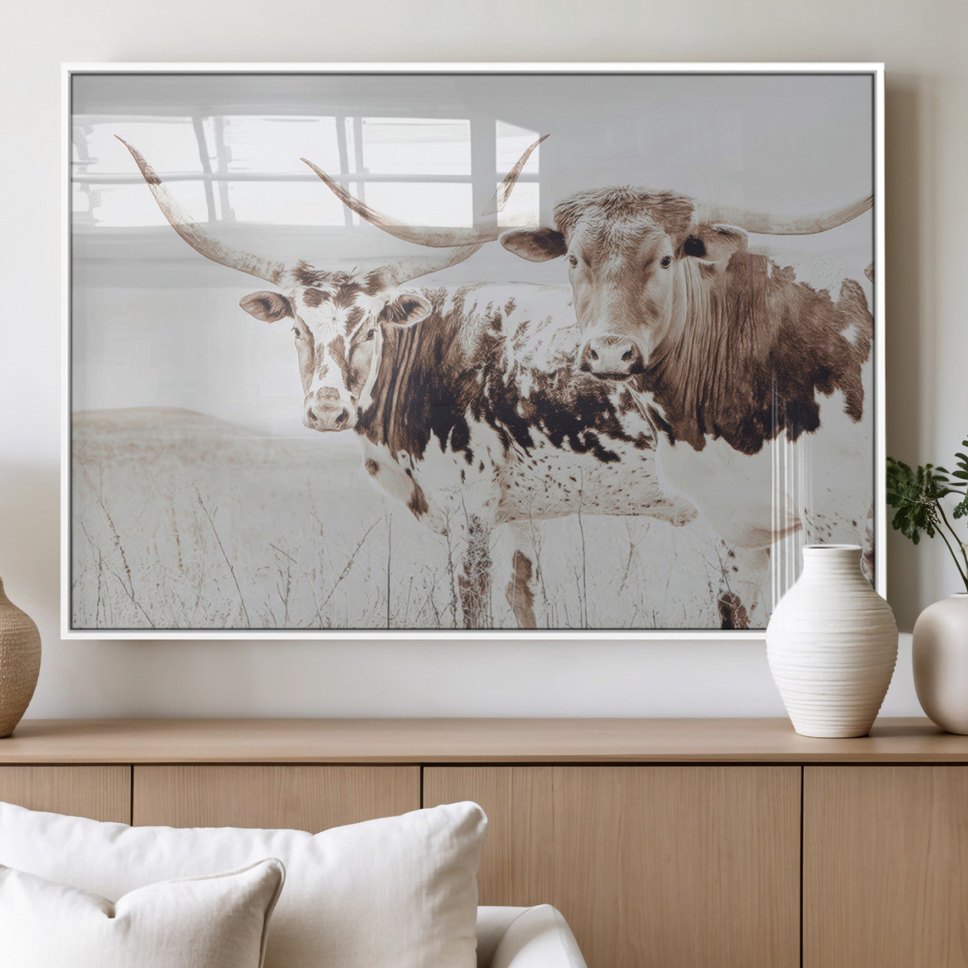 Two longhorn cows standing in a sepia-toned pasture with soft light, ideal for rustic or farmhouse-themed neutral wall decor.