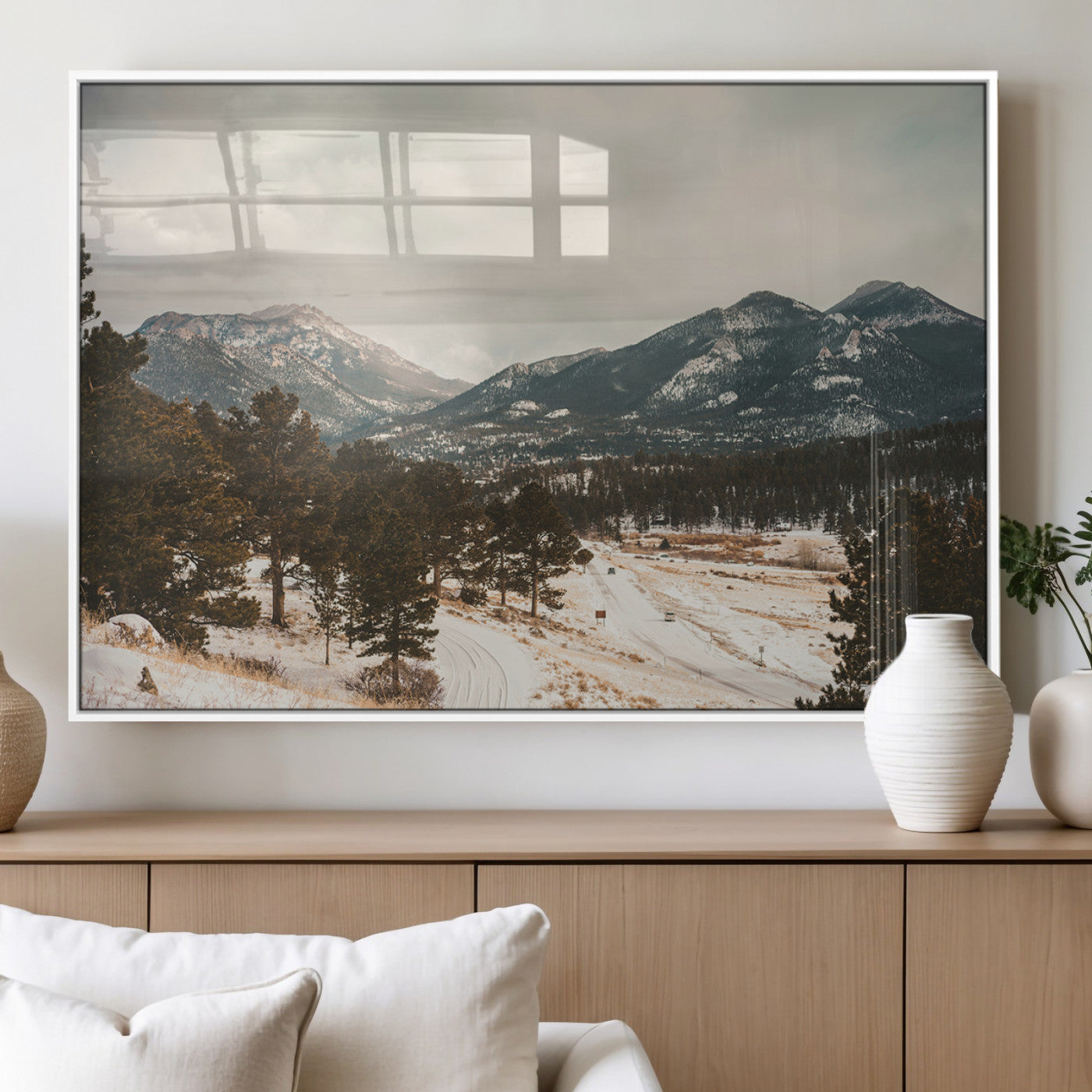 Snow-covered mountains with pine trees and a winding path, creating a serene and rustic winter landscape perfect for cozy decor.