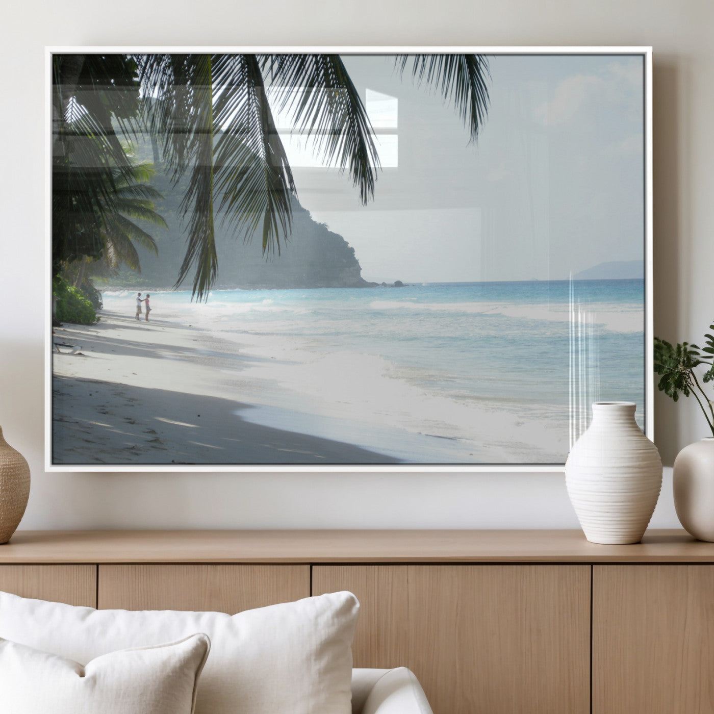 Tropical beach with palm tree shadows, white sand, and turquoise ocean waves, creating a serene and relaxing island escape atmosphere.