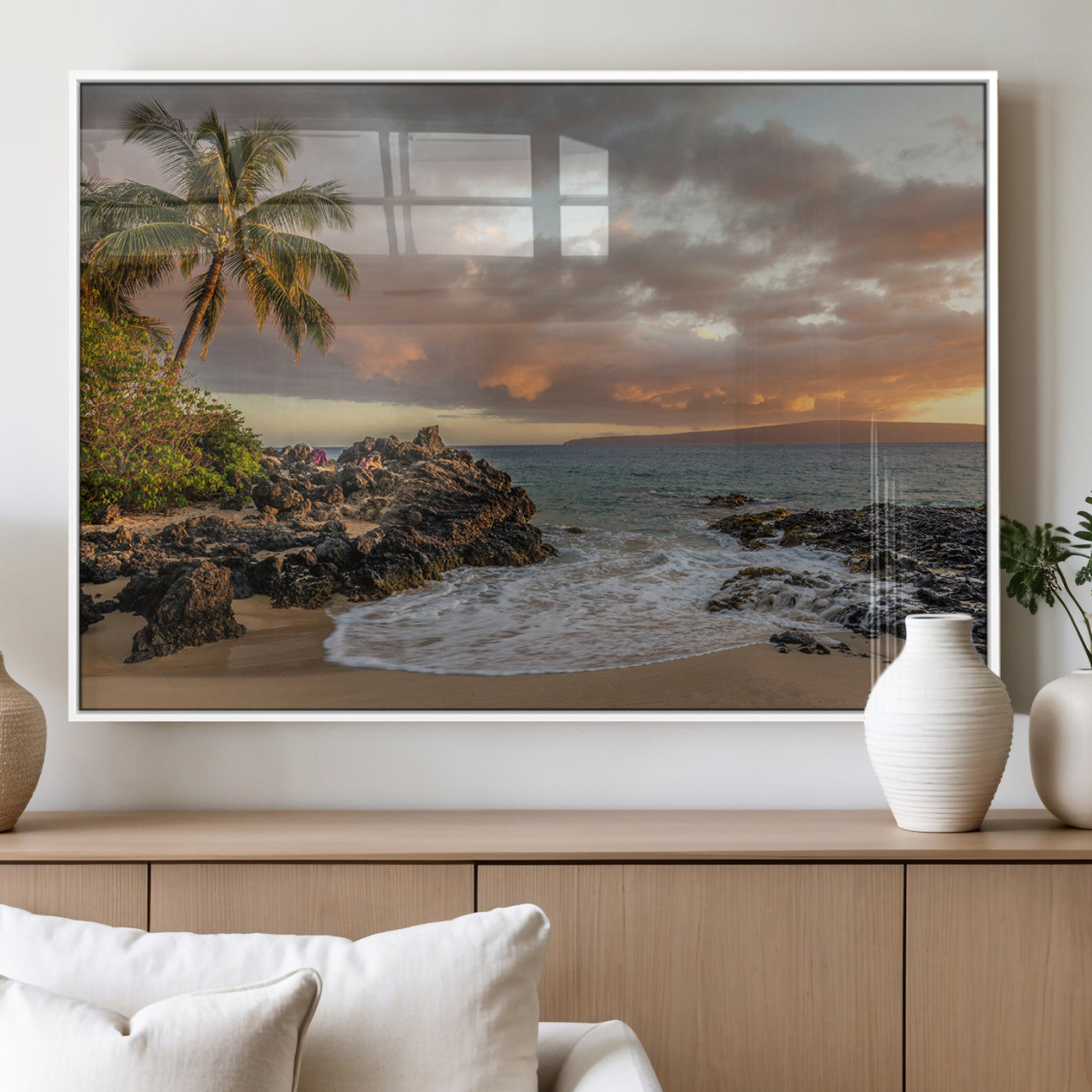 Golden sunset over a tropical beach with palm trees, rocky shoreline, and gentle ocean waves, perfect for coastal and island-inspired decor.