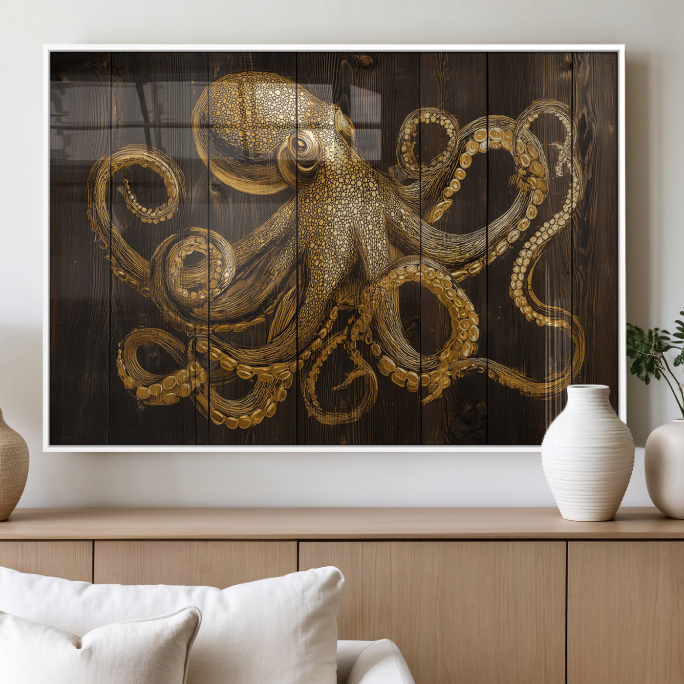 An artistic rendering of an octopus in gold ink on wooden planks, showcasing intricate details of its tentacles and textured skin.
