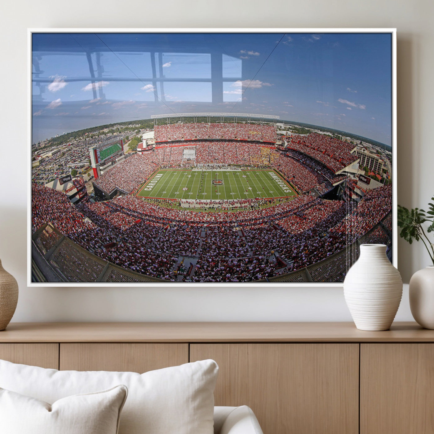 An William Brice-Stadium view of a full football stadium with cheering fans and clear blue skies, capturing the excitement and energy of the game.