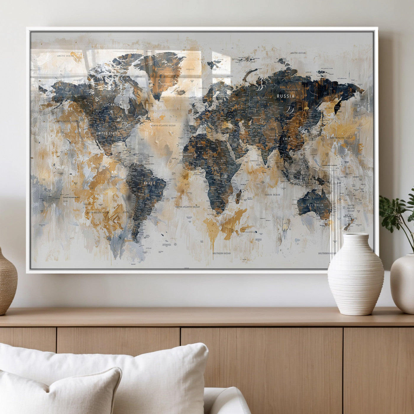 Artistic world map with textured brush strokes in shades of gold, navy blue, and white, showing continents and countries with an abstract, painterly effect.