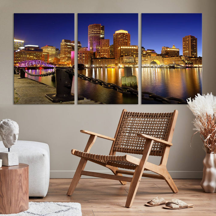 The "Boston City Night Skyline Cityscape View Wall Art Canvas Print" beautifully portrays a stunning triptych of a city skyline illuminated against the night sky, elegantly reflected in the river below. These museum-quality canvases are gallery wrapped to ensure an elegant presentation that enhances any space.