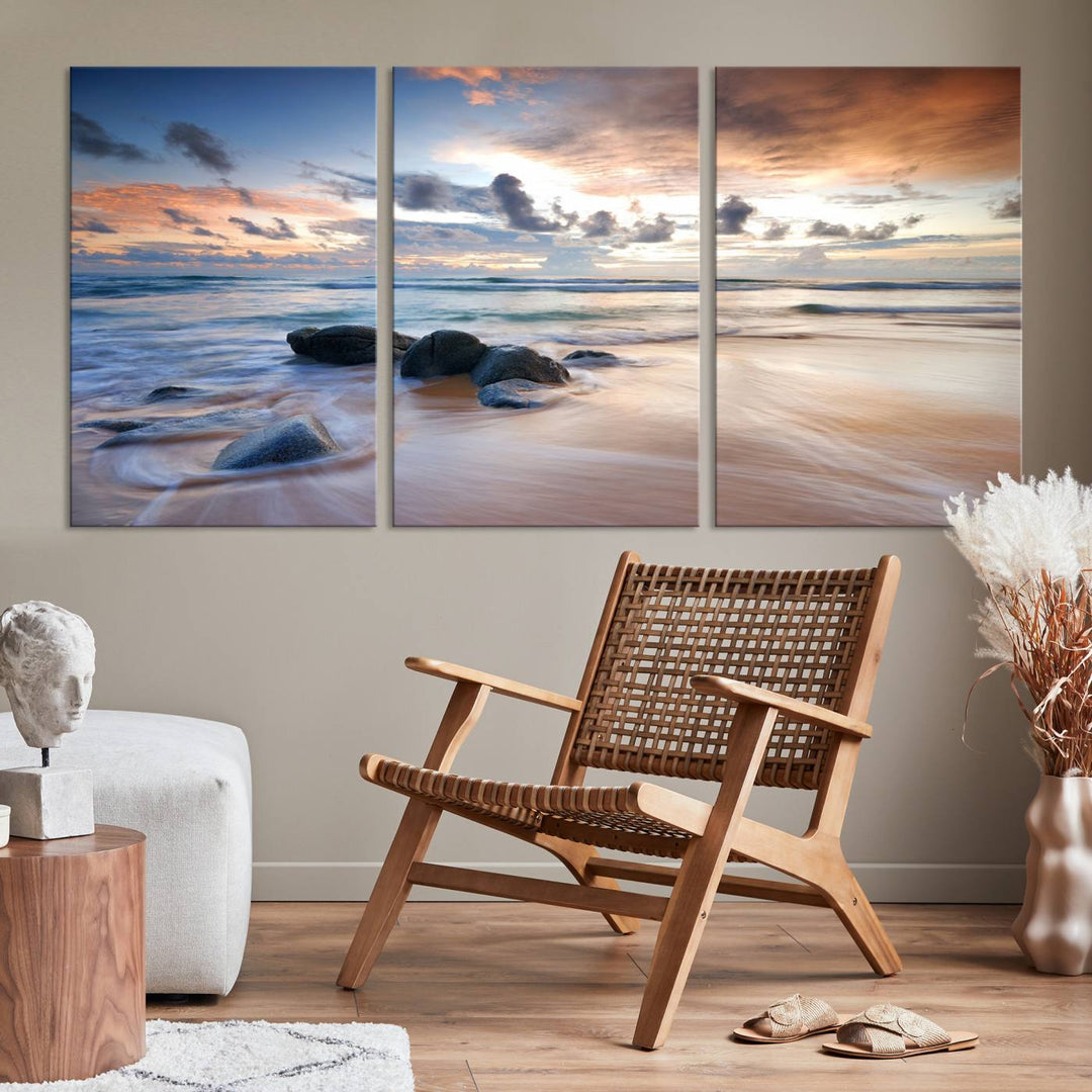 The "Serene Weather On The Beach Wall Art Canvas Print," featuring a tranquil beach scene with rocks and waves, is ready to hang and enjoy.