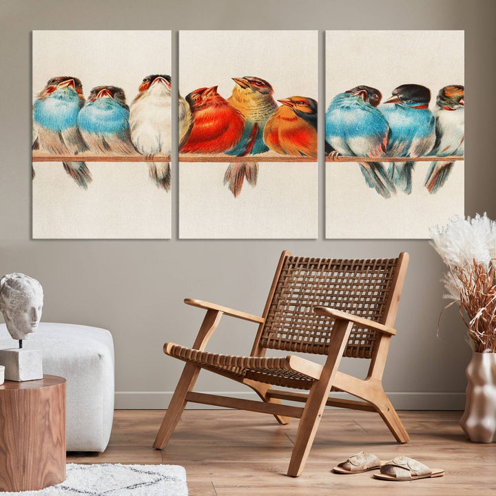 The Abstract Birds Wall Art Canvas Print, featuring a triptych of colorful birds perched on a branch, is printed on museum-quality canvas and equipped with a UV-protective coating and ready-to-hang design. This artwork adds vibrant elegance to your living space.