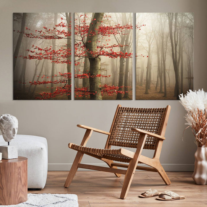 The living room features the Foggy Forest Wall Art, an Autumn Trees Canvas Print that showcases a serene nature scene with foggy woodland decor and a tree adorned in vibrant red leaves.