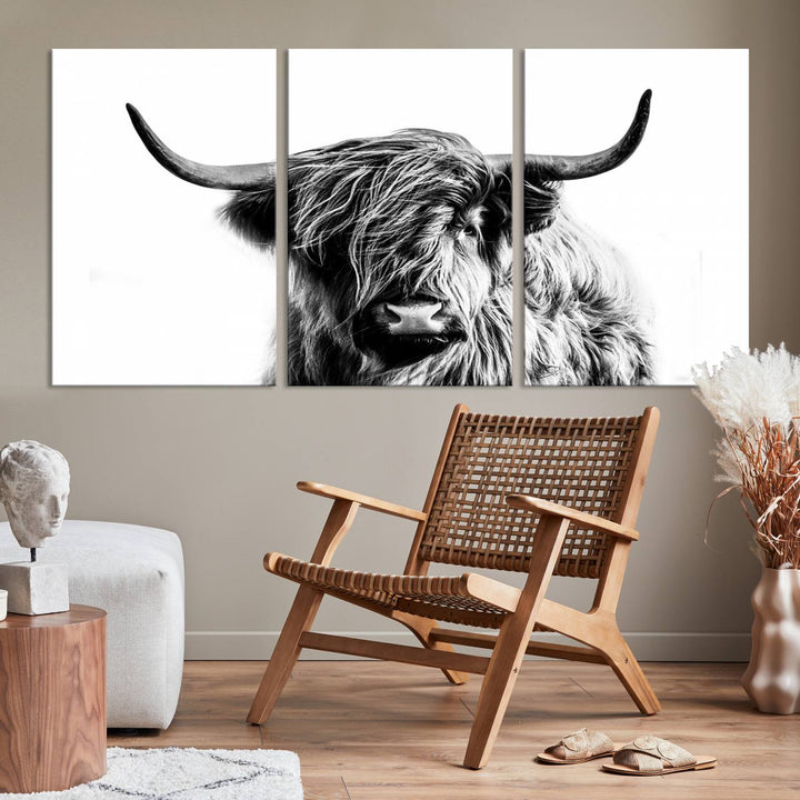 The Scottish Highland Cow Cattle Art Print Farmhouse Wall Art Canvas Print enhances rustic farmhouse decor with its depiction of a long-haired, large-horned cow. This triptych is an ideal choice for chic wall art.