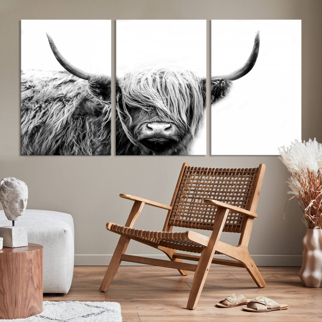 A museum-quality triptych titled "Black White Scottish Highland Cow Cattle Art Print Farmhouse Wall Art Canvas Print" embellishes the dark wall. The canvas is equipped with a UV-protective coating to ensure lasting vibrancy.