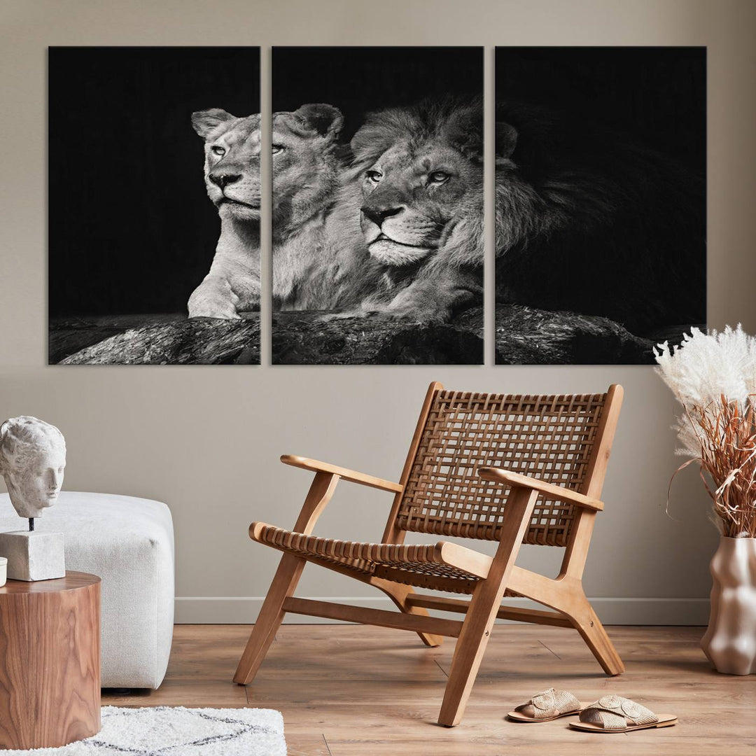 The elegant wildlife portrait, "Lion Couple Canvas Wall Art Print," featuring a black and white depiction of a lion family, majestically decorates the living room wall.