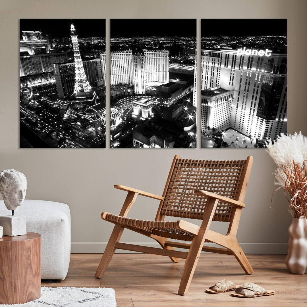 The Las Vegas Wall Art Canvas Print is a black and white triptych that showcases a city skyline at night. Crafted on museum-quality canvas with a UV-protective coating, it serves as an elegant and ready-to-hang focal point in the room.