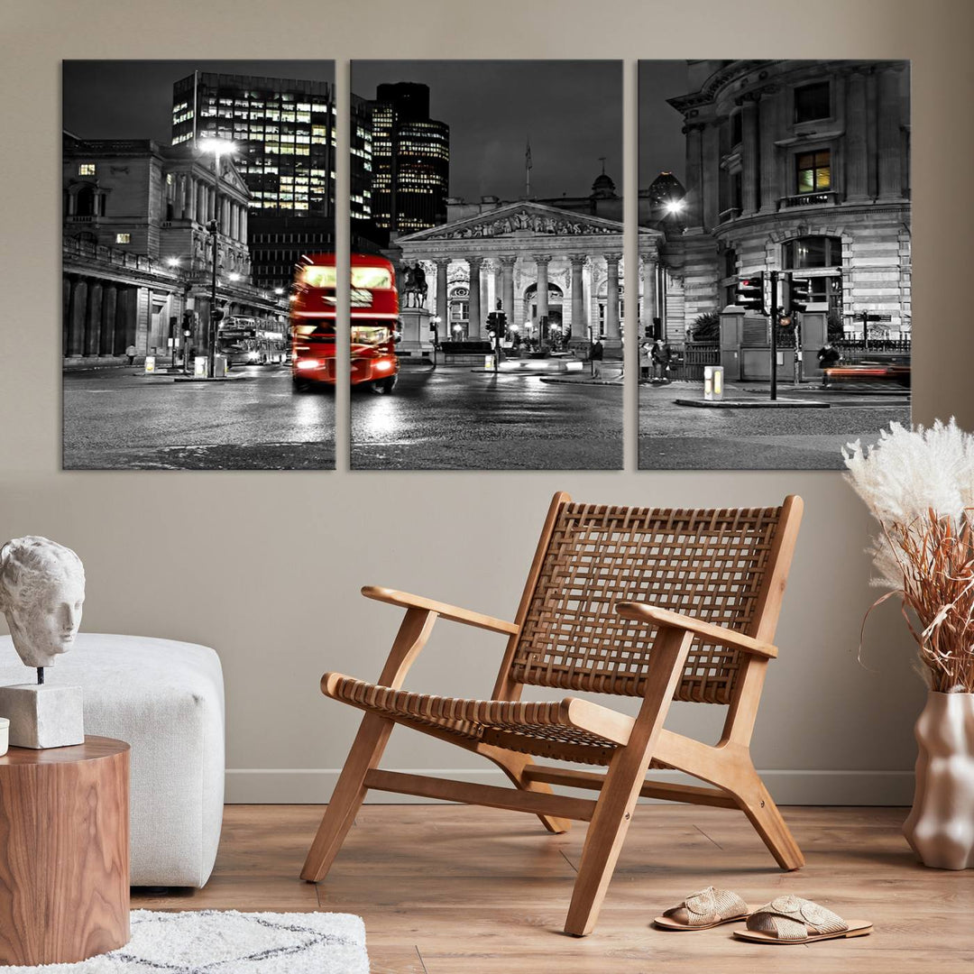 The London Night Red Bus Wall Art Canvas Print features a black and white cityscape with a moving red double-decker bus, crafted on museum-quality canvas with a UV-protective coating. This ready-to-hang artwork is designed to stand out and enhance any space.