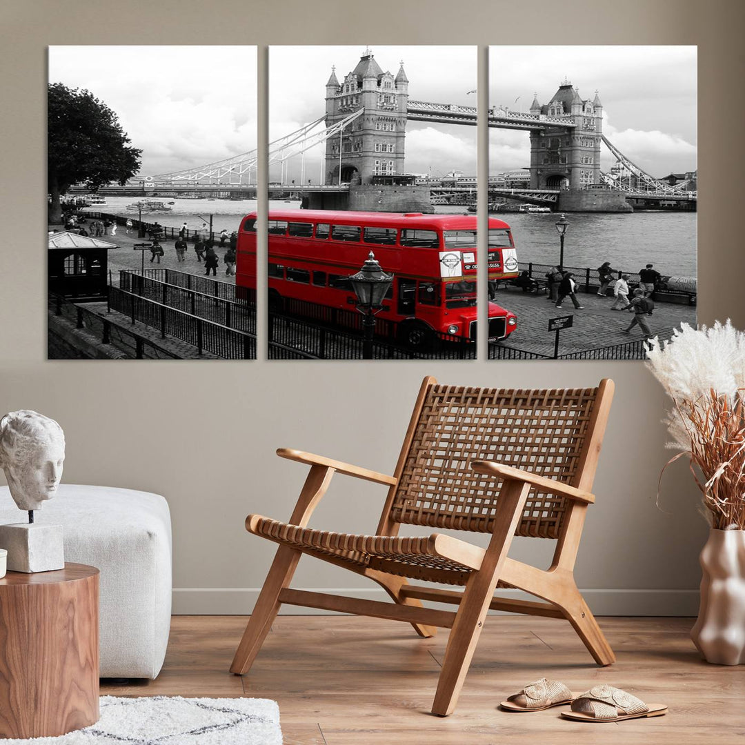 The London Red Bus and Bridge Wall Art Canvas Print showcases a red London bus in front of Tower Bridge, beautifully presented as a gallery-wrapped canvas. This striking image is divided into three panels, delivering a museum-quality display that's ready to hang.