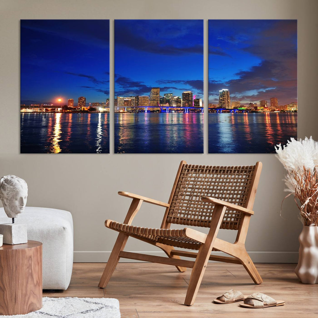 A large Miami City View Wall Art Canvas Print featuring the Miami City Skyline Panorama at night is displayed above the dresser.