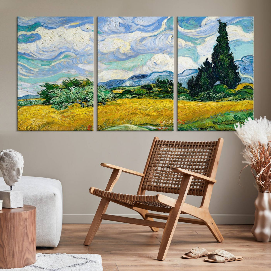 A contemporary living room features a large triptych of "Wheatfield With Cypresses By Van Gogh Painting Wall Art Canvas Print." Crafted on museum-quality canvas, this artwork brings a sense of elegance and craftsmanship reminiscent of professional artistry.