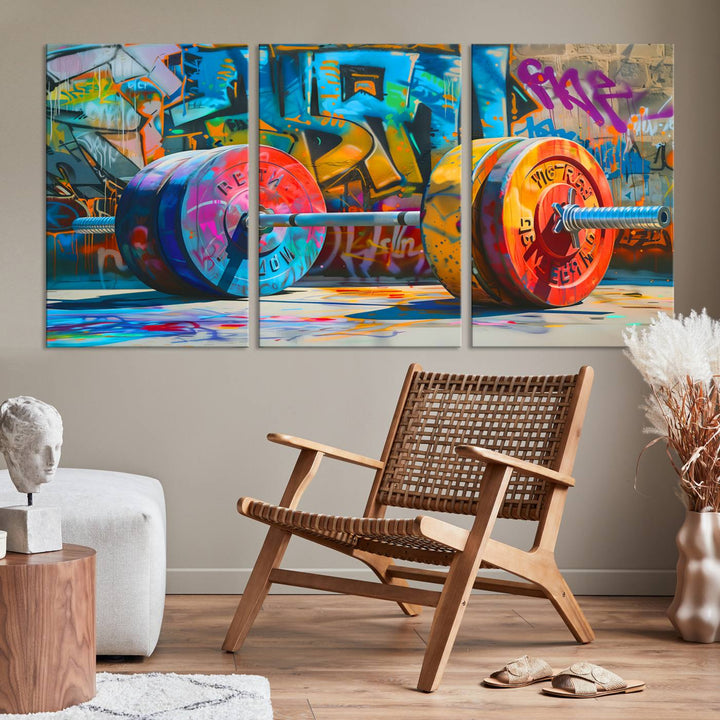 The Fitness Gym Barbell Graffiti Wall Art Canvas Print, a vibrant triptych featuring a barbell against a graffiti backdrop, elegantly hangs in the room. Crafted on premium canvas with a gallery-quality finish, this stunning piece of wall art effortlessly combines urban flair with sophisticated decor.