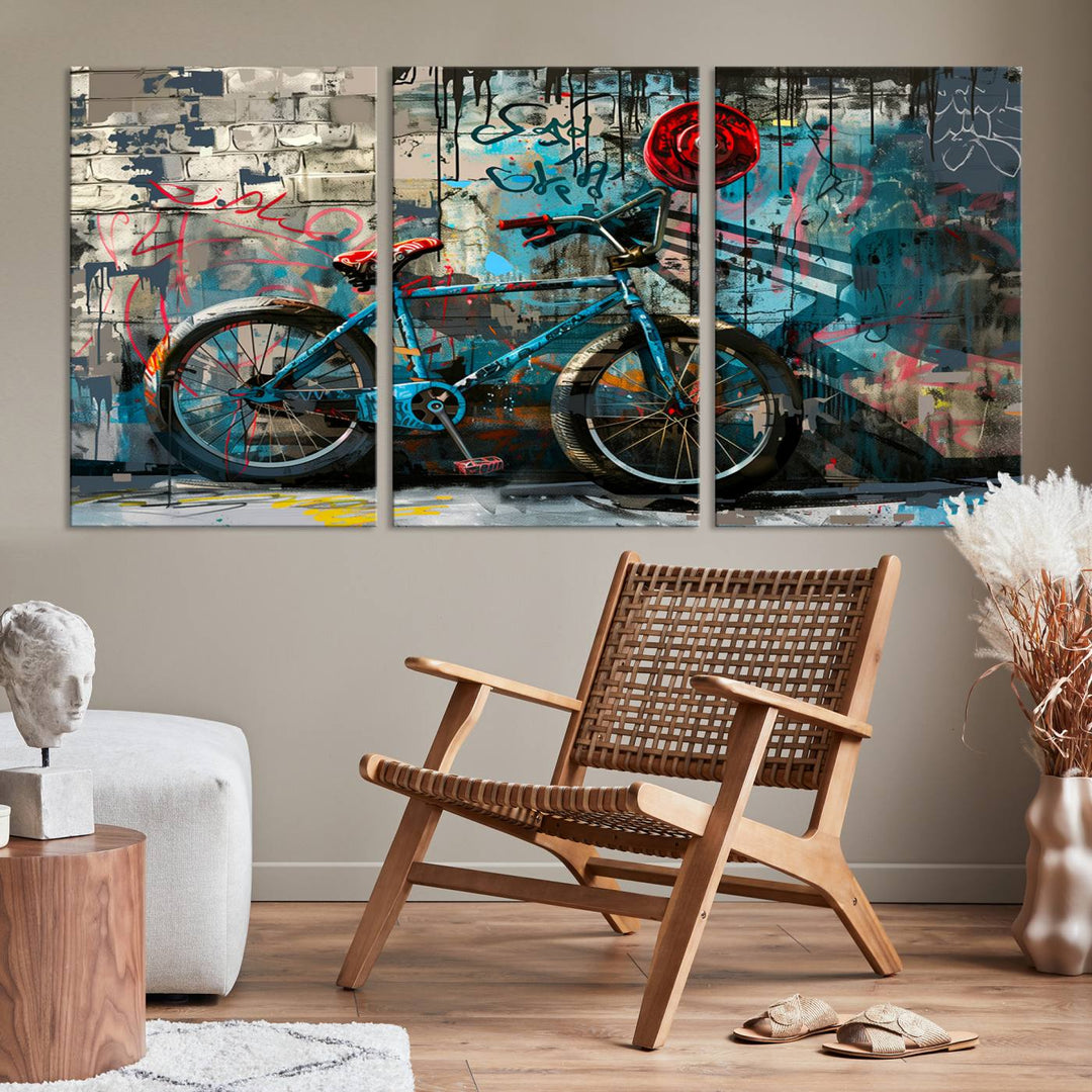 A modern living room features a triptych wall art of an abstract bicycle, designed in a graffiti style on a brick wall. This piece is expertly crafted on the Abstract Bicycle Wall Art Canvas Print, offering a premium canvas that ensures a gallery-quality finish.