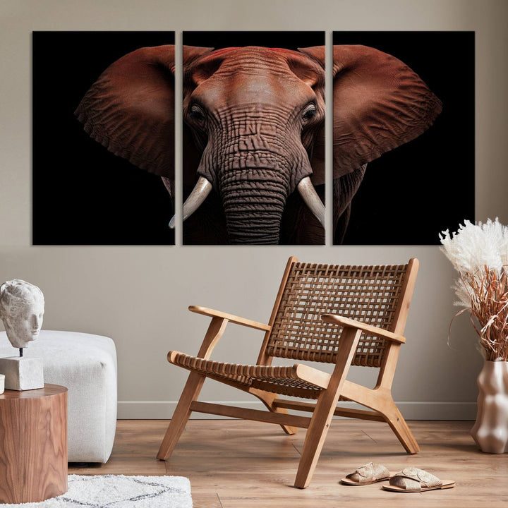 A stunning triptych titled "Wild Elephant Wall Art Canvas Print" beautifully enhances the wall above a contemporary living room. This Africa Savannah Wild Animal Wall Decor Print is of museum-quality, complete with a UV-protective coating to ensure its vibrancy and beauty are preserved for years.