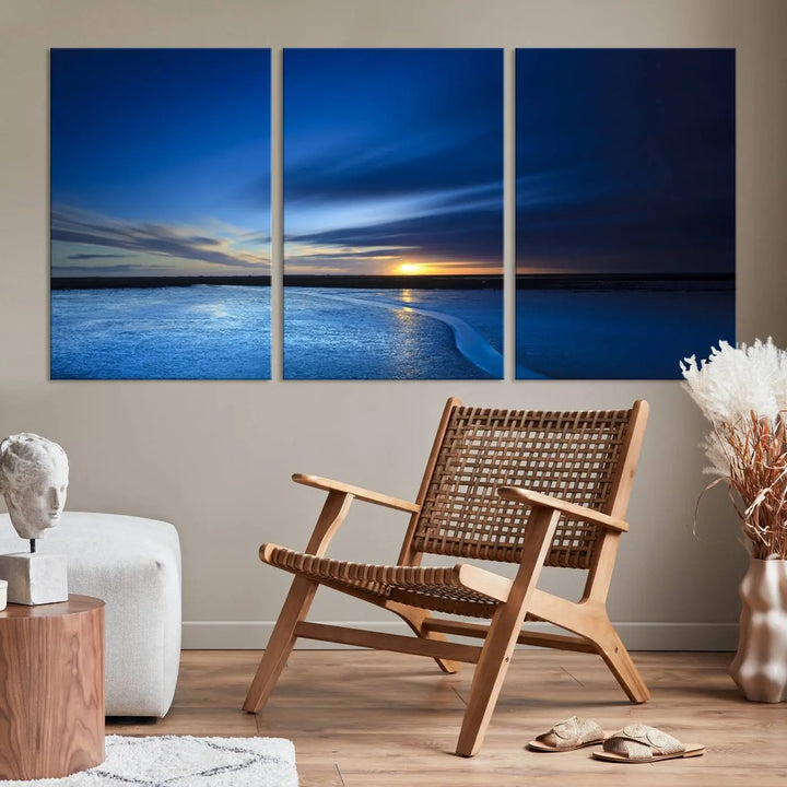 The living room features a triptych of the Wall Art Canvas Print Navy Sunset Lake Landscape Artwork, adding to its tranquil vibe.