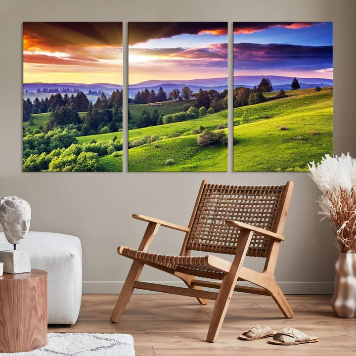 The room features a large triptych of the Green Hills and Sunset Wall Art Print, showcasing a scenic landscape with lush greenery and a vibrant sky.