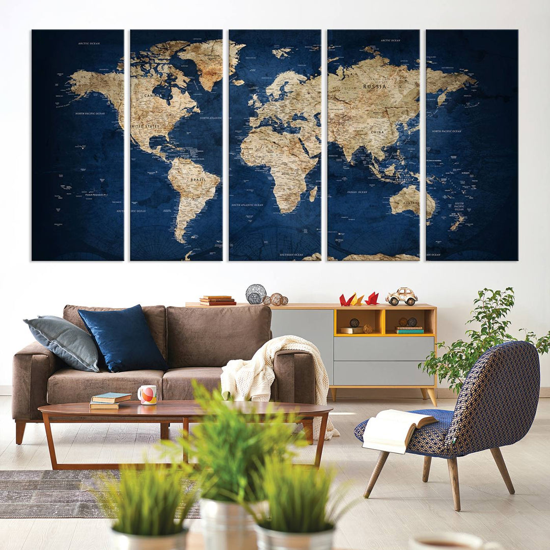 A triptych canvas print titled "Vintage Blue World Map Canvas Print - Classic World Map Design on Deep Blue Wall Art Print" adorns the wall, enhancing the decor with its antique style.