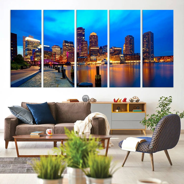 A triptych of the "Boston City Lights Night Blue Skyline Cityscape View Wall Art Canvas Print" adorns the wall. This museum-quality canvas artwork is ready to hang and includes a UV-protective coating for lasting brilliance.