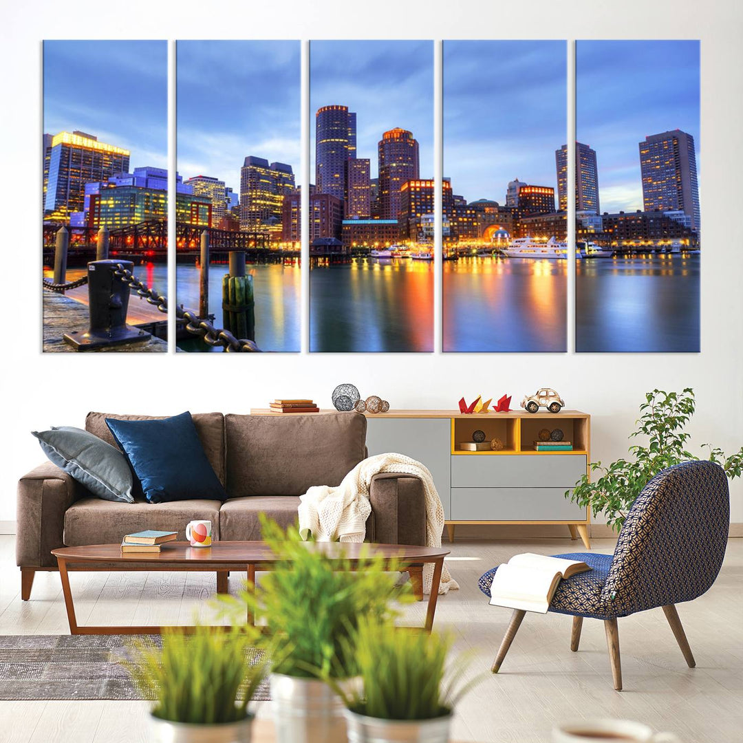 The Boston City Lights Sunset Cloudy Blue Skyline Cityscape View Wall Art Canvas Print embellishes a contemporary living room. This gallery-wrapped canvas set guarantees museum-quality canvases to enhance any space.