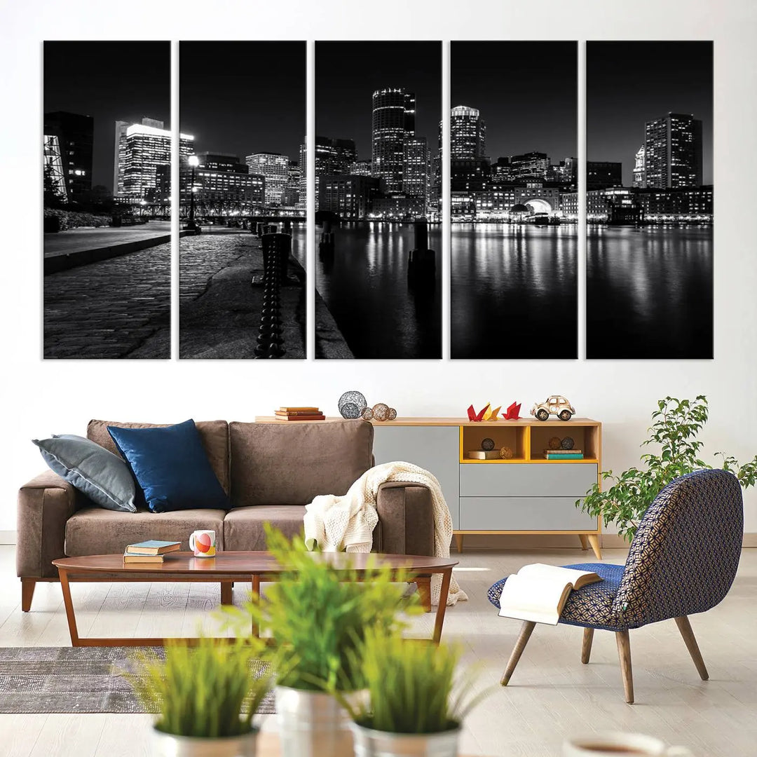 The Boston City Lights Skyline Black and White Wall Art Cityscape Canvas Print portrays a triptych of the city skyline at night reflecting on a calm river. This museum-quality canvas features UV-protective finishes to preserve its timeless allure.