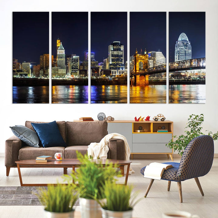 The Cincinnati City Lights Night Skyline Cityscape View Wall Art Canvas Print, crafted on museum-quality canvas with UV-protective coating and ready to hang, adds a touch of sophistication to the wall.