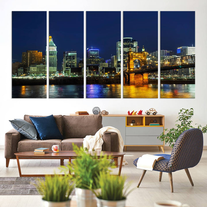 The "Cincinnati City Lights Night Skyline Cityscape" canvas print, displayed above a sofa, exhibits museum-quality craftsmanship with a UV-protective coating.