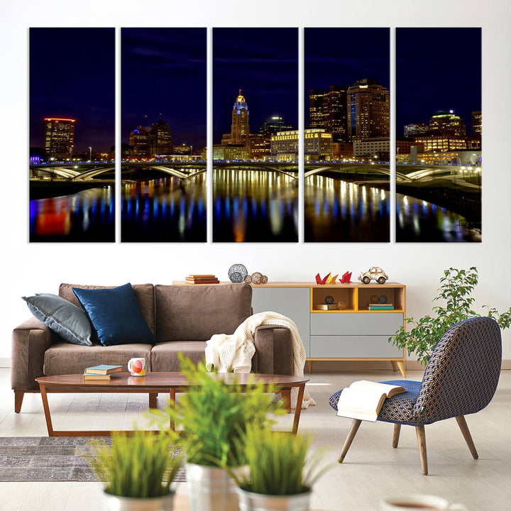 The "Columbus City Lights Night Skyline Cityscape View Wall Art Canvas Print" showcases a stunning city skyline at night, with illuminated buildings and bridges reflecting in the river, on a museum-quality canvas ready to hang.