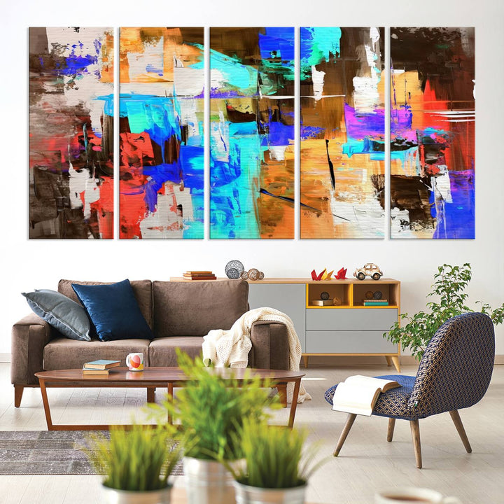 In a modern living room, the "Colorful Abstract Wall Art Canvas Print" serves as a stunning triptych centerpiece on museum-quality canvas, ready to hang. Its UV-protective coating ensures enduring vibrancy.