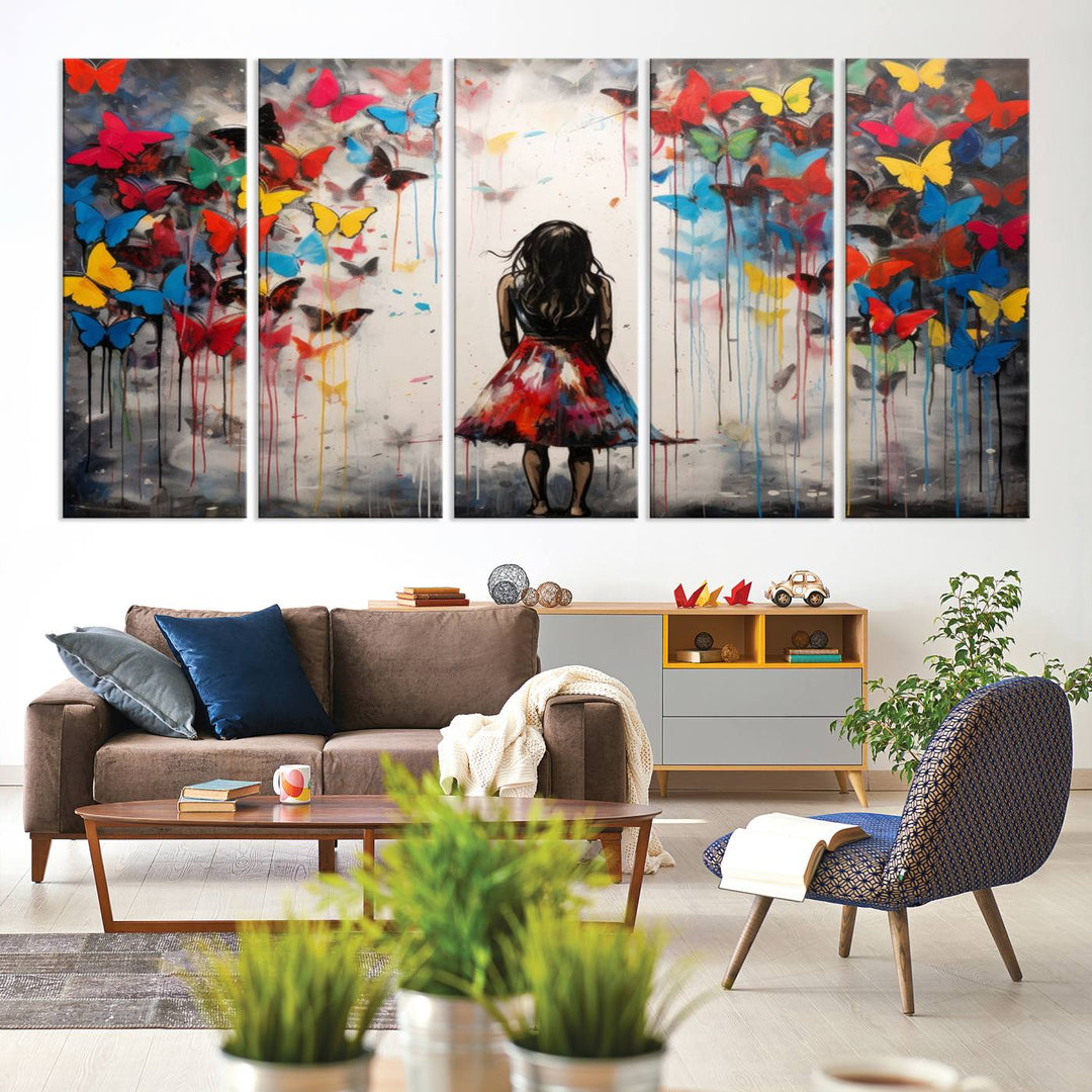 The Girl Butterfly Graffiti Abstract Canvas Print, featuring a vibrant depiction of a girl surrounded by butterflies on museum-quality canvas, is displayed prominently.