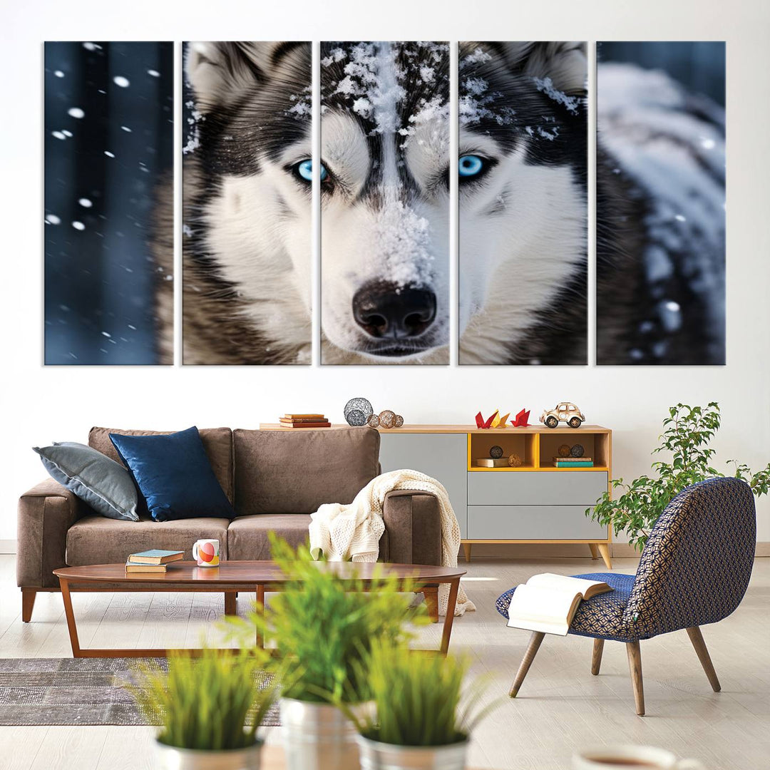 A digital art piece titled "Winter Siberian Husky Wolf Wall Art Canvas Print" showcases a blue-eyed husky blanketed in snow. Printed on high-quality canvas, it is an ideal choice for nature and dog enthusiasts.