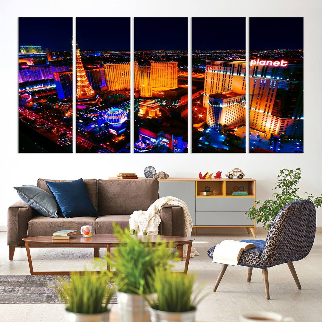 Las Vegas Wall Art Canvas Print showcases a dynamic and luminous cityscape at night with tall buildings and bustling streets. Expertly printed on museum-quality canvas, this gallery-wrapped artwork is enhanced with a UV-protective coating to ensure lasting brilliance.