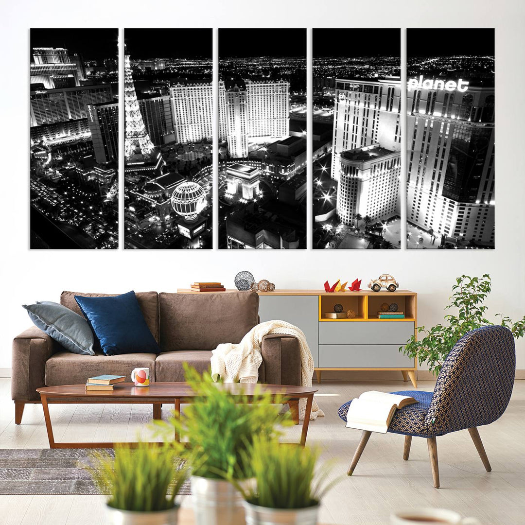 The Las Vegas Wall Art Canvas Print is a black and white triptych that showcases a city skyline at night. Crafted on museum-quality canvas with a UV-protective coating, it serves as an elegant and ready-to-hang focal point in the room.