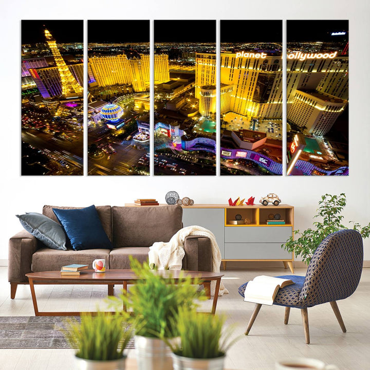 The modern living room features a Las Vegas Wall Art Canvas Print, a museum-quality triptych showcasing a vibrant cityscape with neon lights.