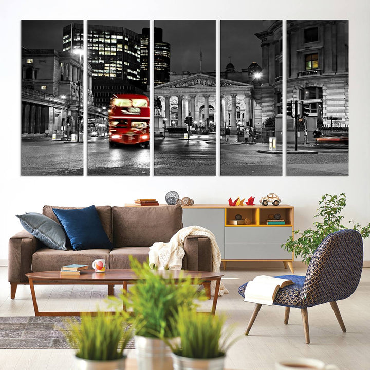 The London Night Red Bus Wall Art Canvas Print features a black and white cityscape with a moving red double-decker bus, crafted on museum-quality canvas with a UV-protective coating. This ready-to-hang artwork is designed to stand out and enhance any space.