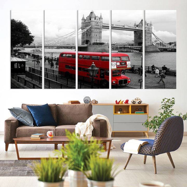 The London Red Bus and Bridge Wall Art Canvas Print showcases a red London bus in front of Tower Bridge, beautifully presented as a gallery-wrapped canvas. This striking image is divided into three panels, delivering a museum-quality display that's ready to hang.