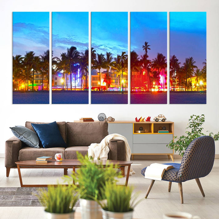 The living room features a three-panel Miami City Wall Art Canvas Print, showcasing a colorful, illuminated beach scene with palm trees on museum-quality canvas.