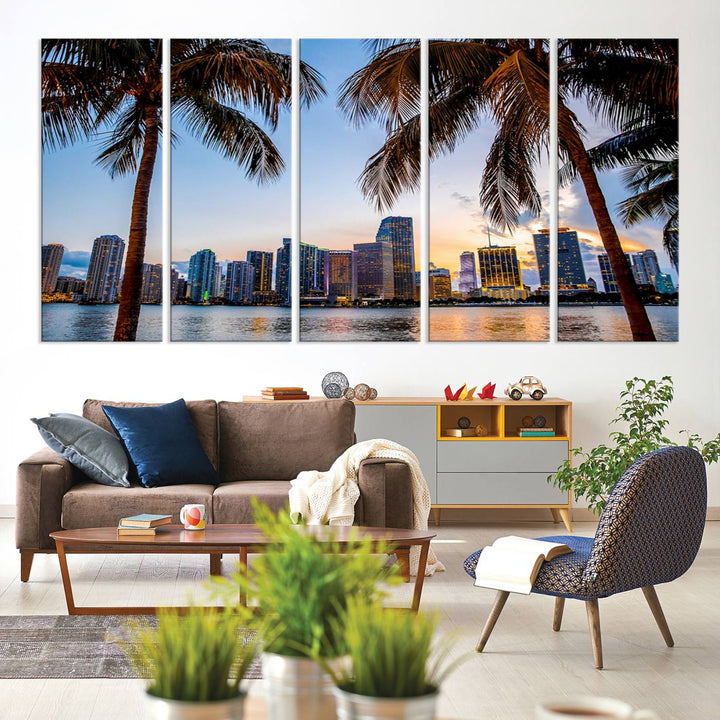 The Wall Art MIAMI Canvas Print features a triptych design depicting palm trees and a city skyline at sunset.