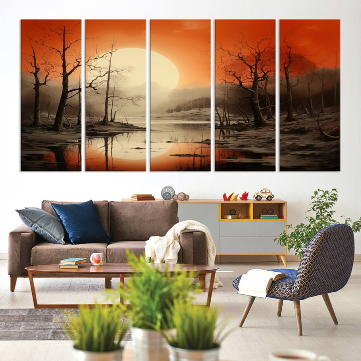 The "Abstract Watercolor Trees and Sunset on Lake Wall Art" is a triptych masterpiece, showcasing an orange-hued landscape of barren trees and a large sun. Displayed on museum-quality canvases with UV-protective coating, it creates a striking visual element in any space.