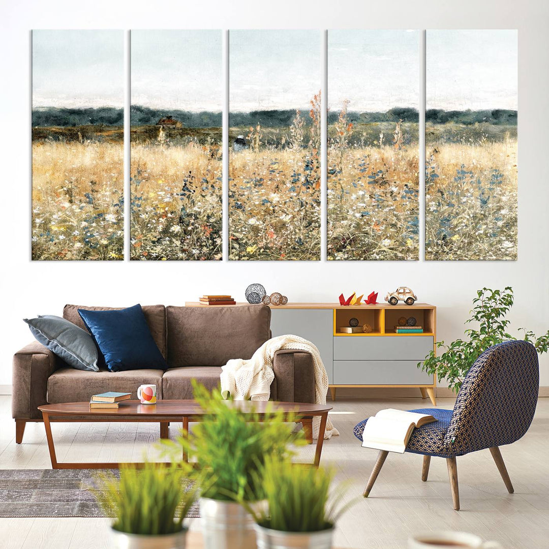 The "Wildflower Field Wall Art Canvas" brings rustic charm to the room with its nature-inspired landscape print, making it a perfect addition to the living room or office.