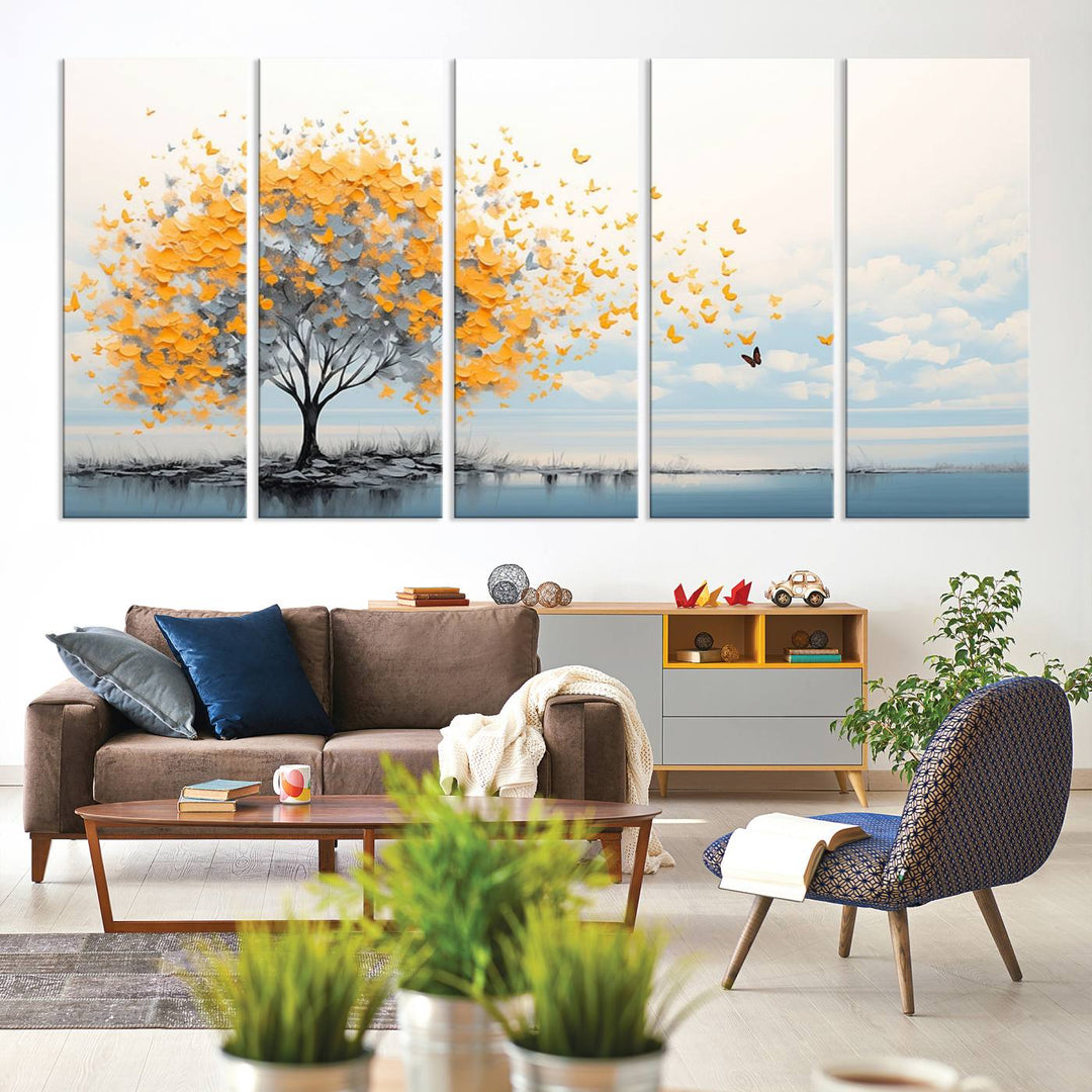 Abstract tree with yellow butterflies canvas wall art in a modern living room setting.